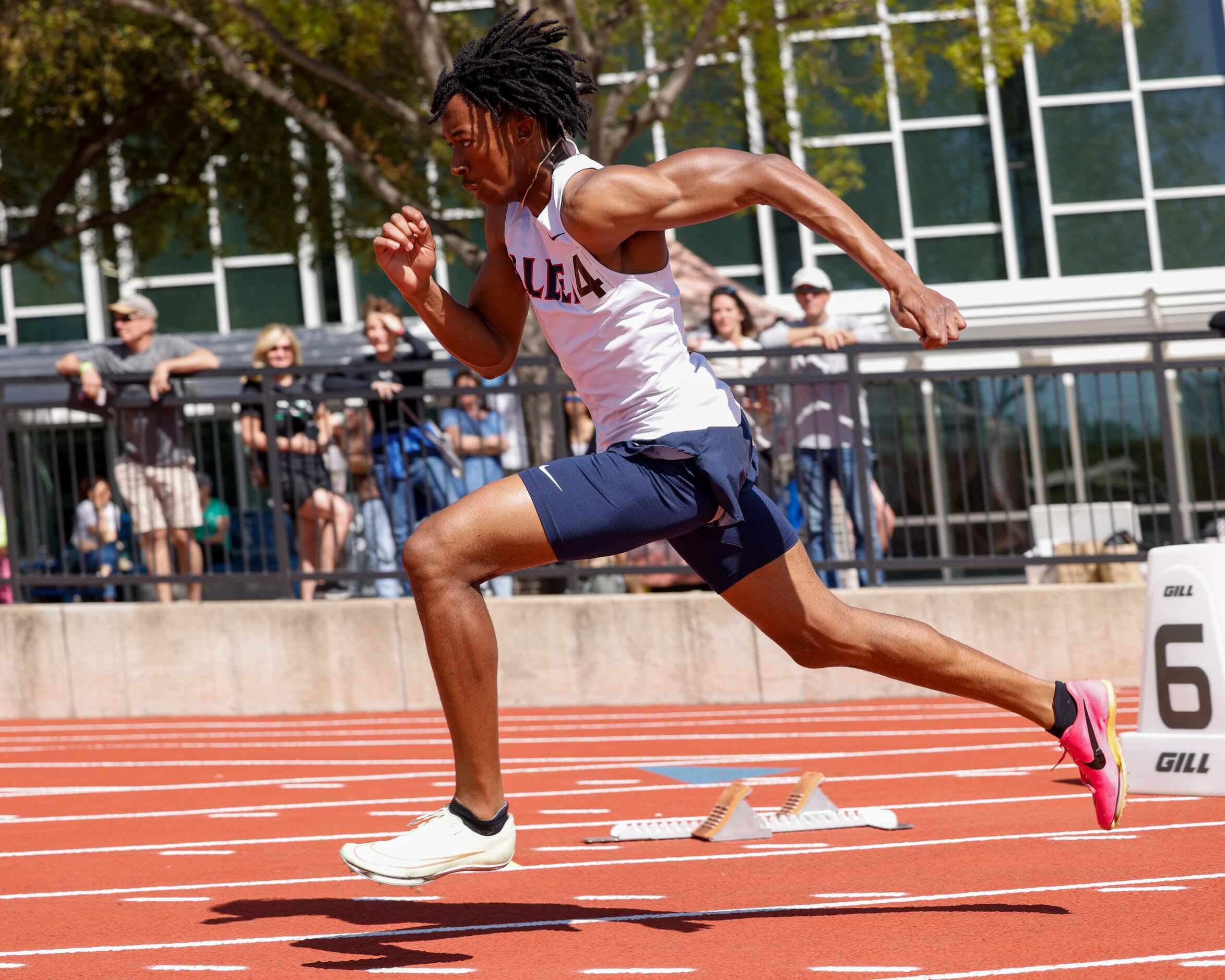 Allen’s Jonathan Simms runs during the 6A 400 meter dash during the Jesuit-Sheaner Relays at...