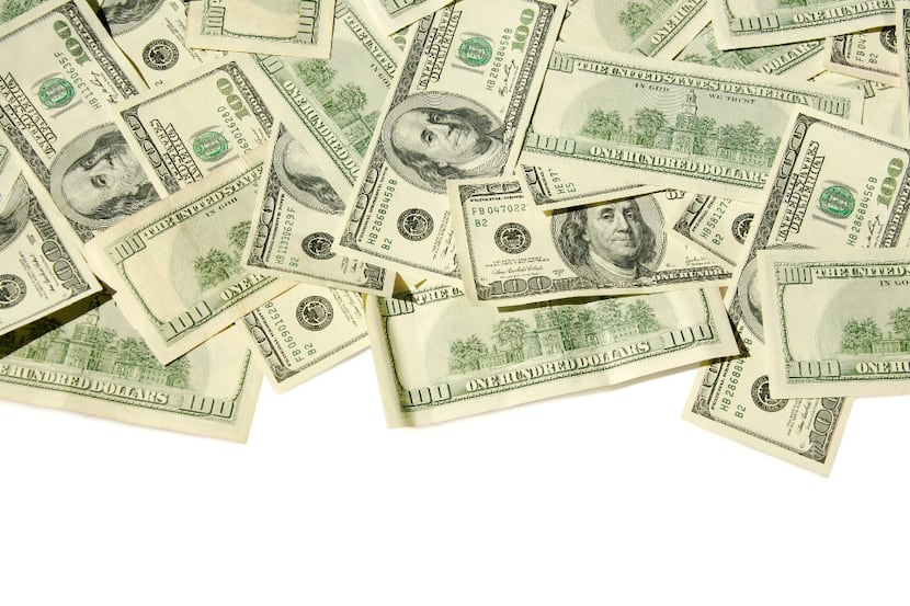 Photo illustration of money
Lot's of US $100 bills on a white background (clipping path is...