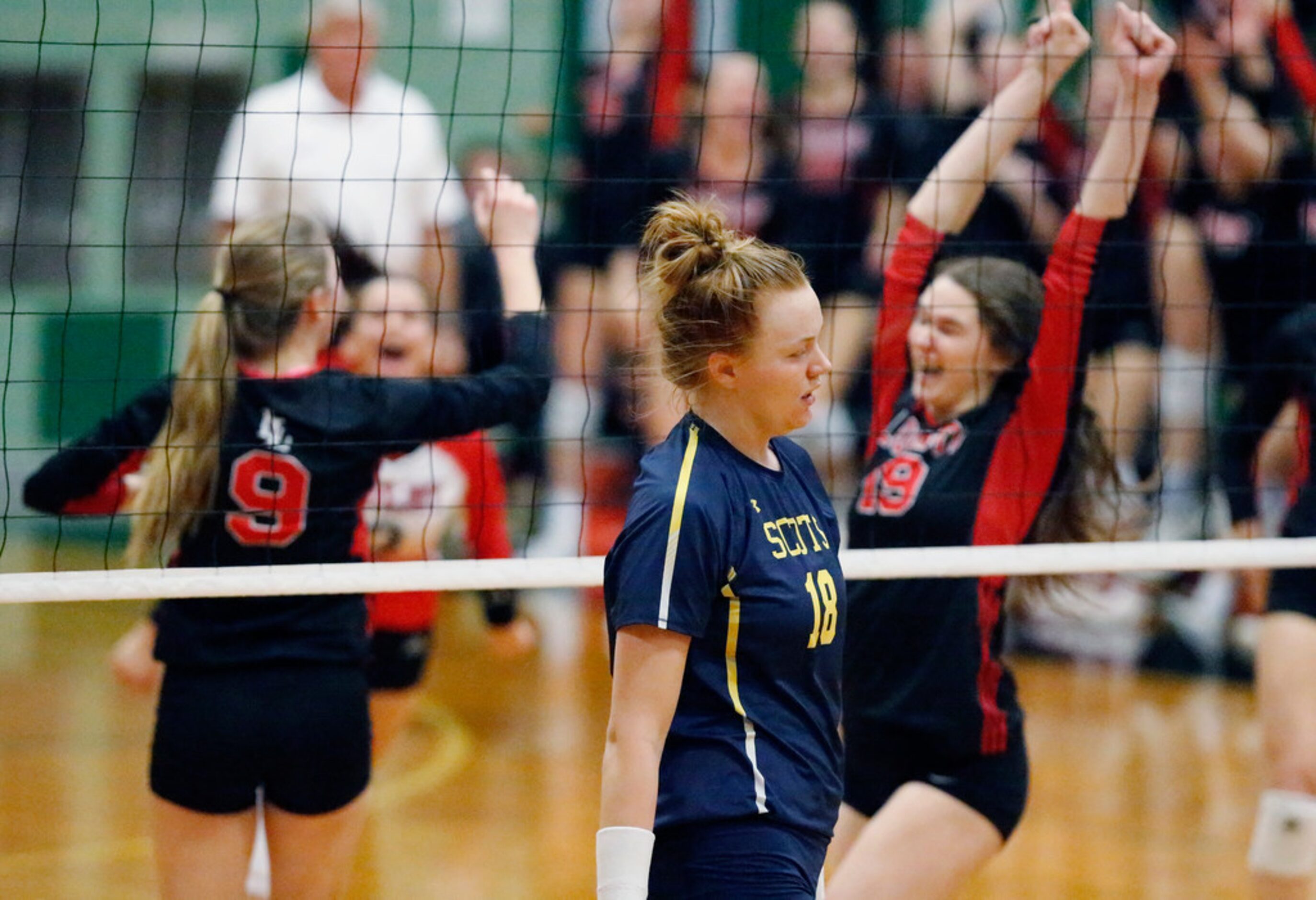 Lovejoy High School setter Averi Carlson (9) and Lovejoy High School middle hitter Lexie...