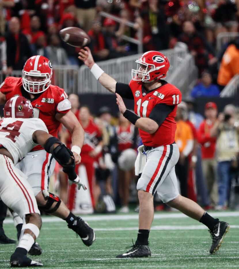 Georgia Bulldogs quarterback Jake Fromm (11) attempts a third quarter pass against the...