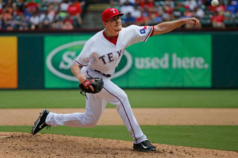 Texas Rangers relief pitcher Jake Diekman (41) is pictured during the Seattle Mariners vs....