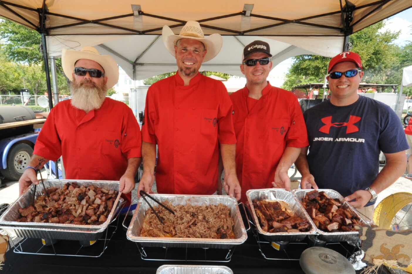 Plano Fire Department team smokes brisket and ribs at Battle of the Pitmasters at NorthPark...