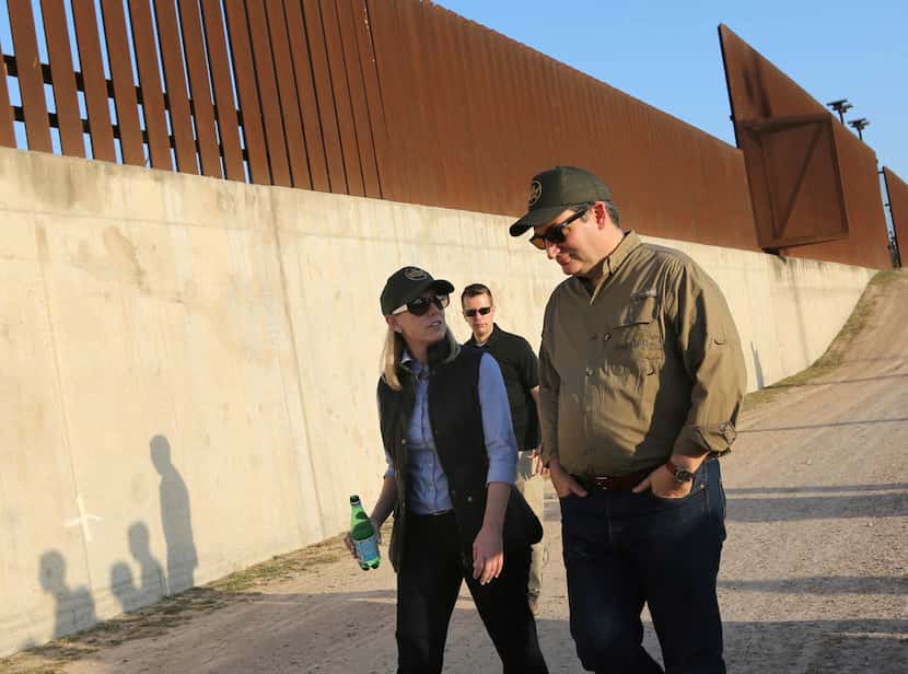 Sen. Ted Cruz walks with Homeland Security Secretary Kirstjen Nielsen along the border wall...