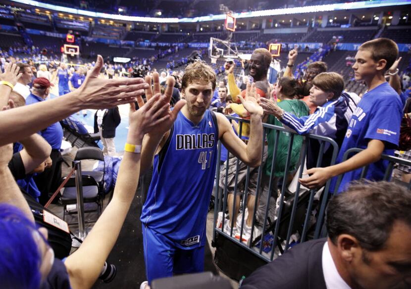Dallas Mavericks power forward Dirk Nowitzki (41) exits the court after defeating the...