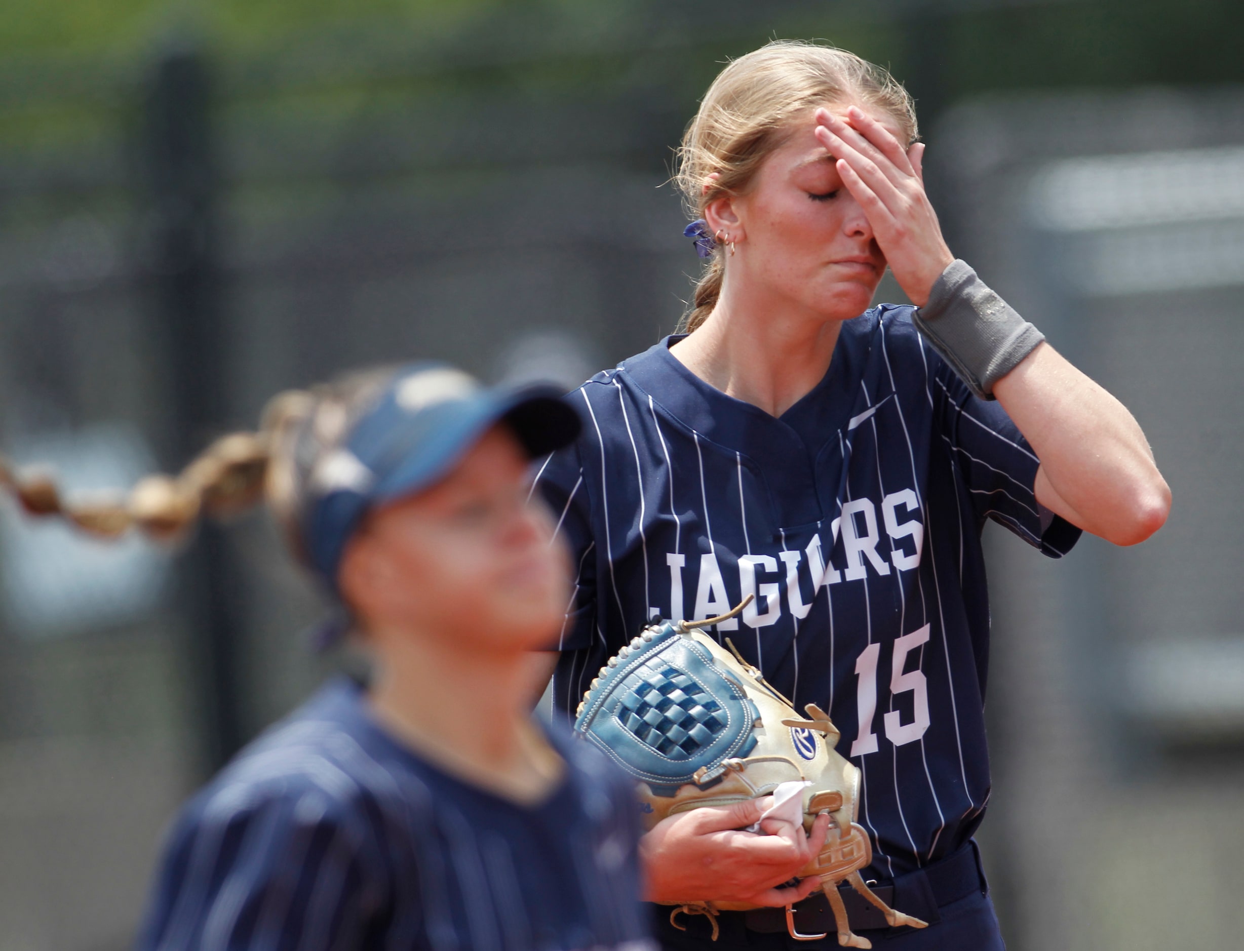 Flower Mound pitcher Landry Harris (15) reacts after completing the top half of the first...