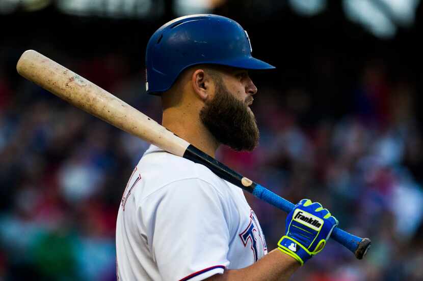 Texas Rangers first baseman Mike Napoli (5) waits his turn to bat during the first inning of...