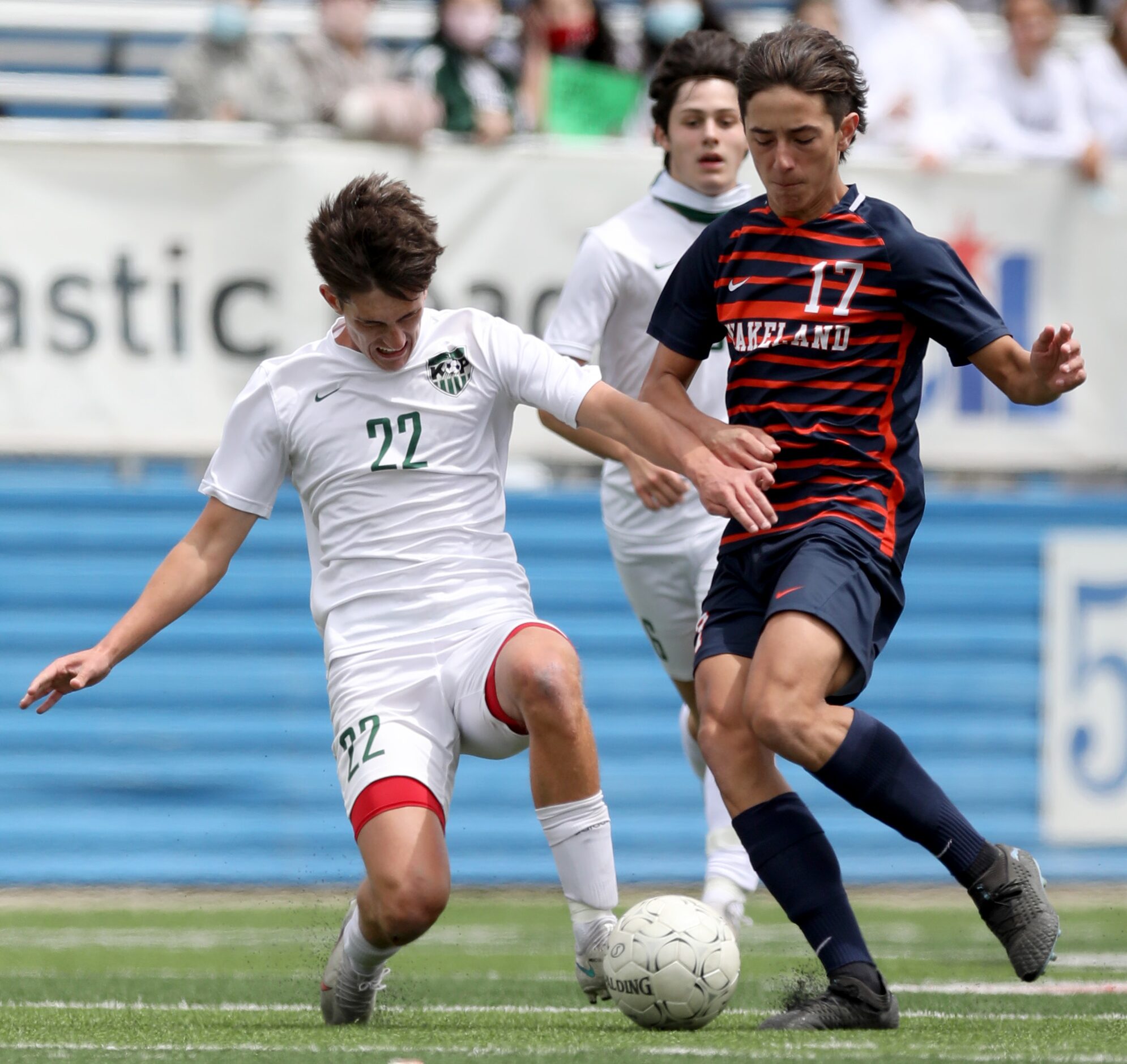 Frisco Wakeland's Riley Garza (17) and Humble Kingwood Park's Tony Sterner (22) go after the...