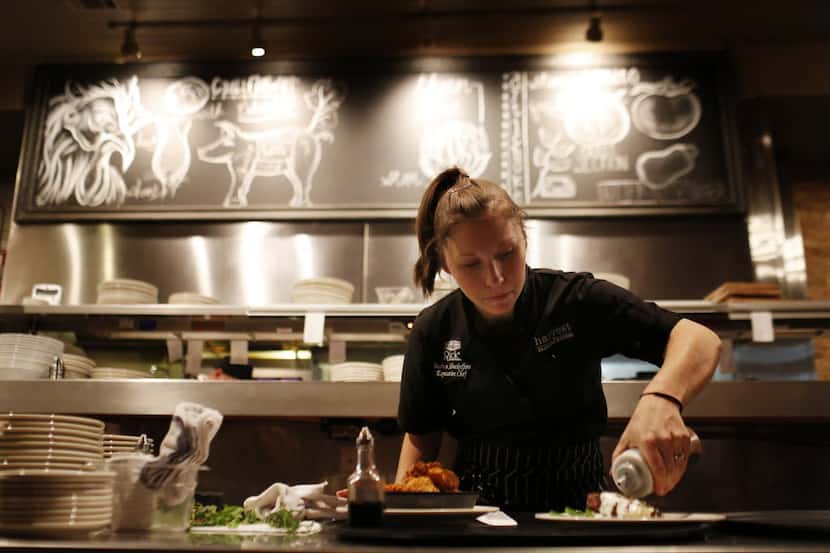 Executive chef Andrea Shackelford works in the kitchen at Harvest Seasonal Kitchen in...