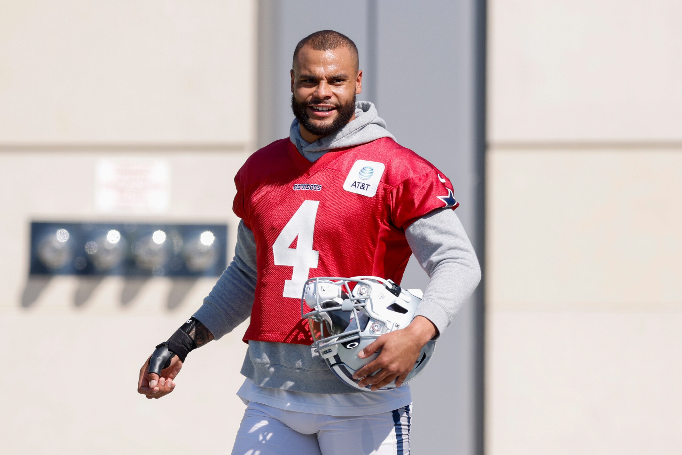 Dallas Cowboys quarterback Dak Prescott (4) walks to the field during a practice at The...