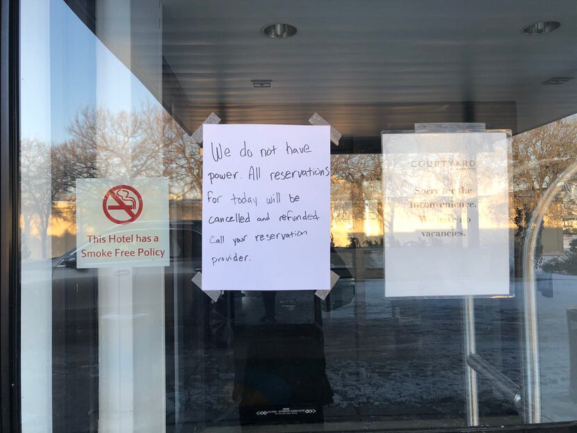 A note posted on the front door of the Courtyard Marriott in Addison on Feb. 15, 2021.