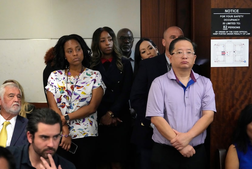 A standing room only crowd of people in the 482nd District Court at the Harris County...