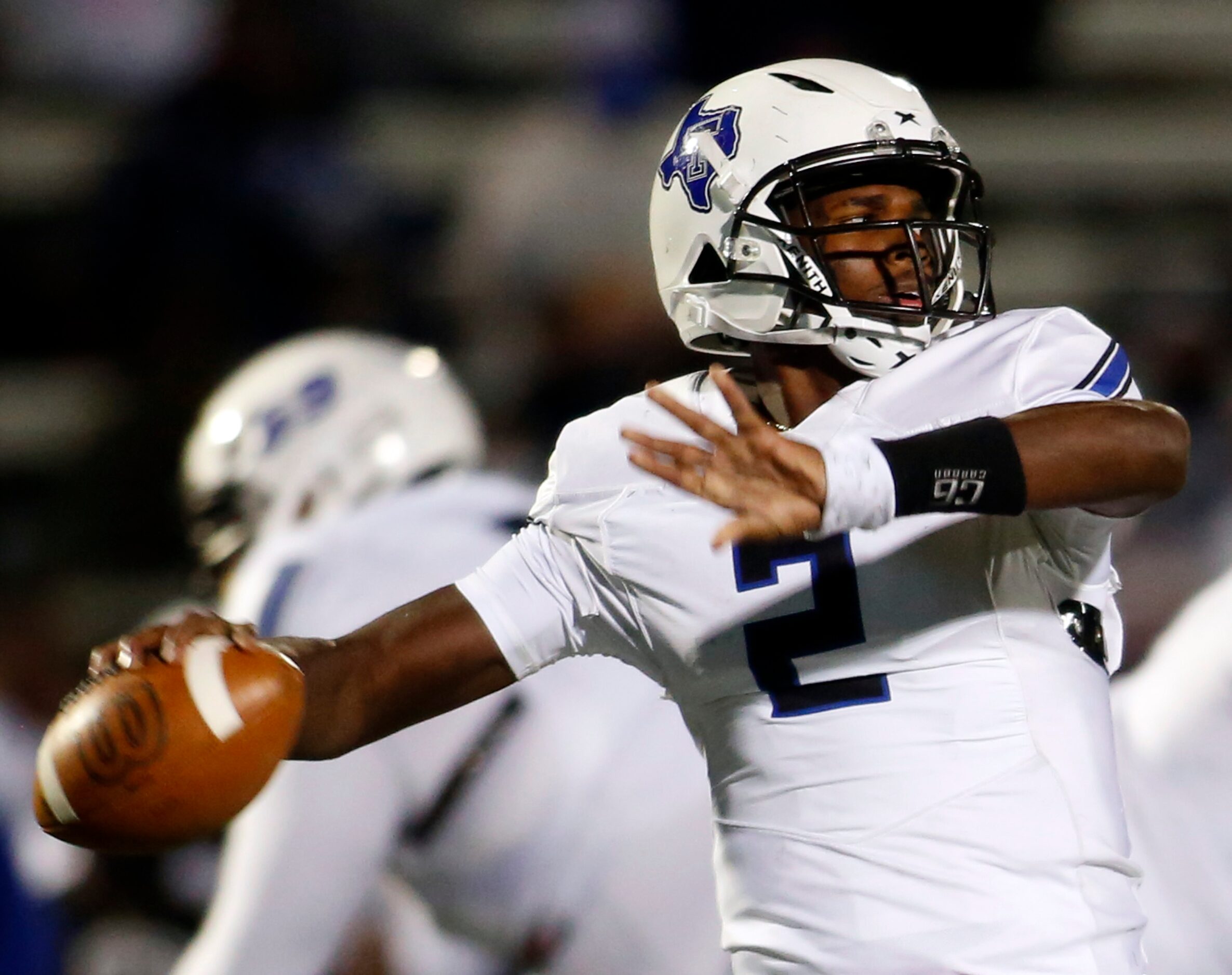 Trinity Christian Cedar Hill quarterback Shedeur Sanders (2) prepares to launch a pass deep...