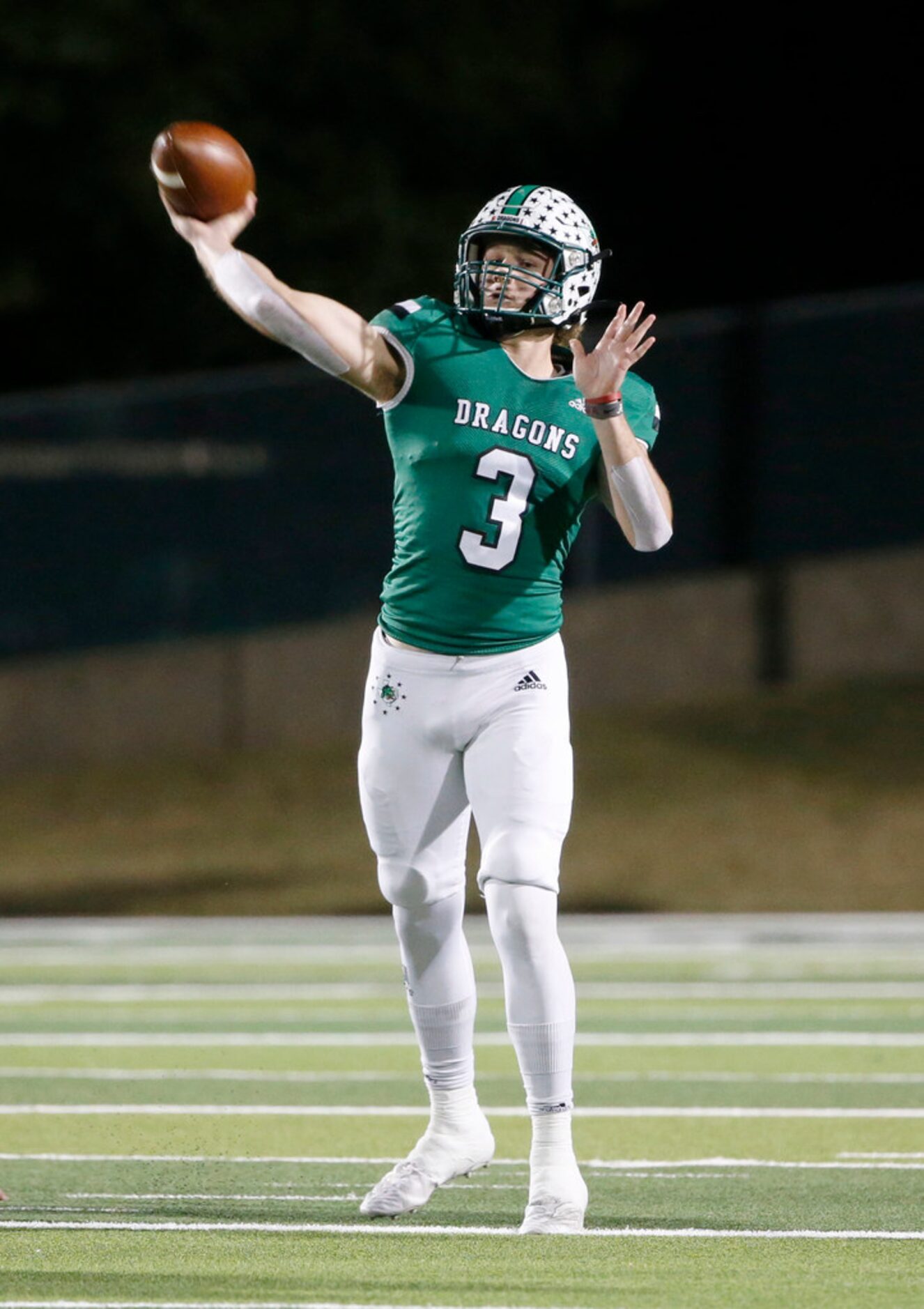 Southlake's Quinn Ewers (3) throws the ball against Eaton during the first half of their...