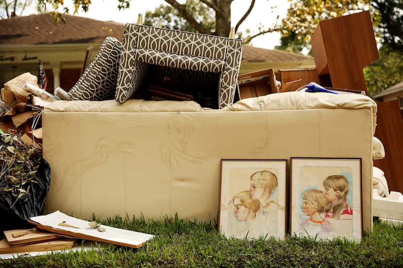 One family had to trash portraits and much of their furniture.