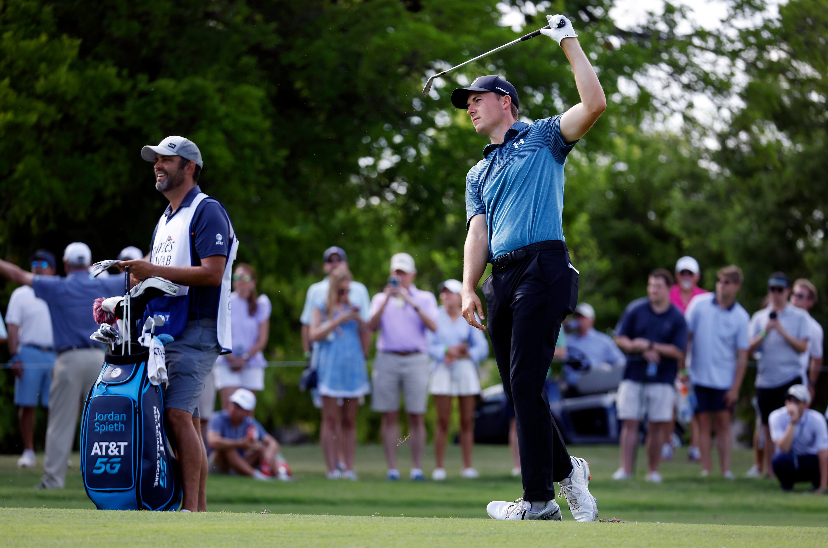 Professional golfer Jordan Spieth lets go of his swing after hitting an approach shot on No....