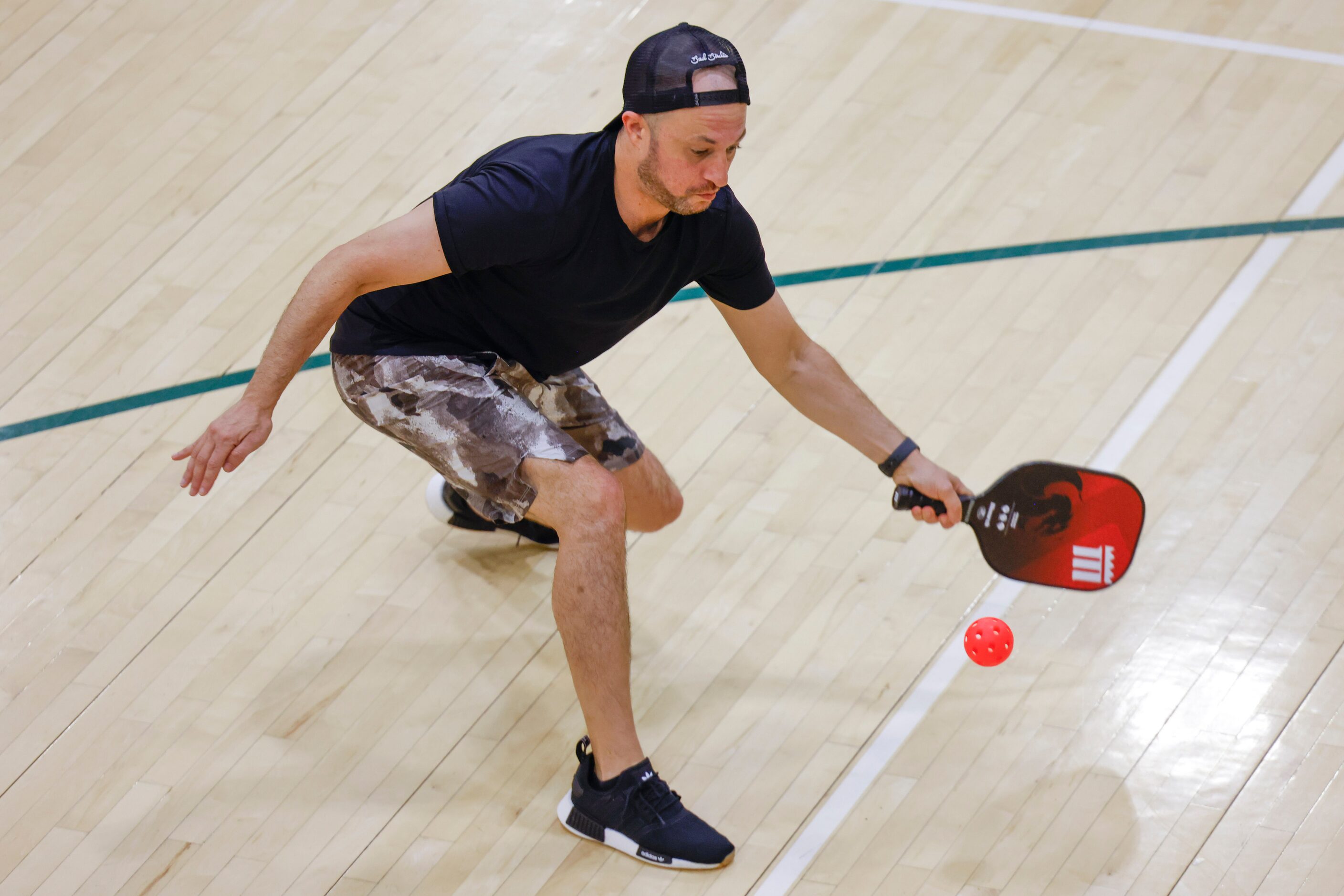 Ryan Kinked of Frisco hits during a pickle ball game on Friday, May 26, 2023 at Tom...