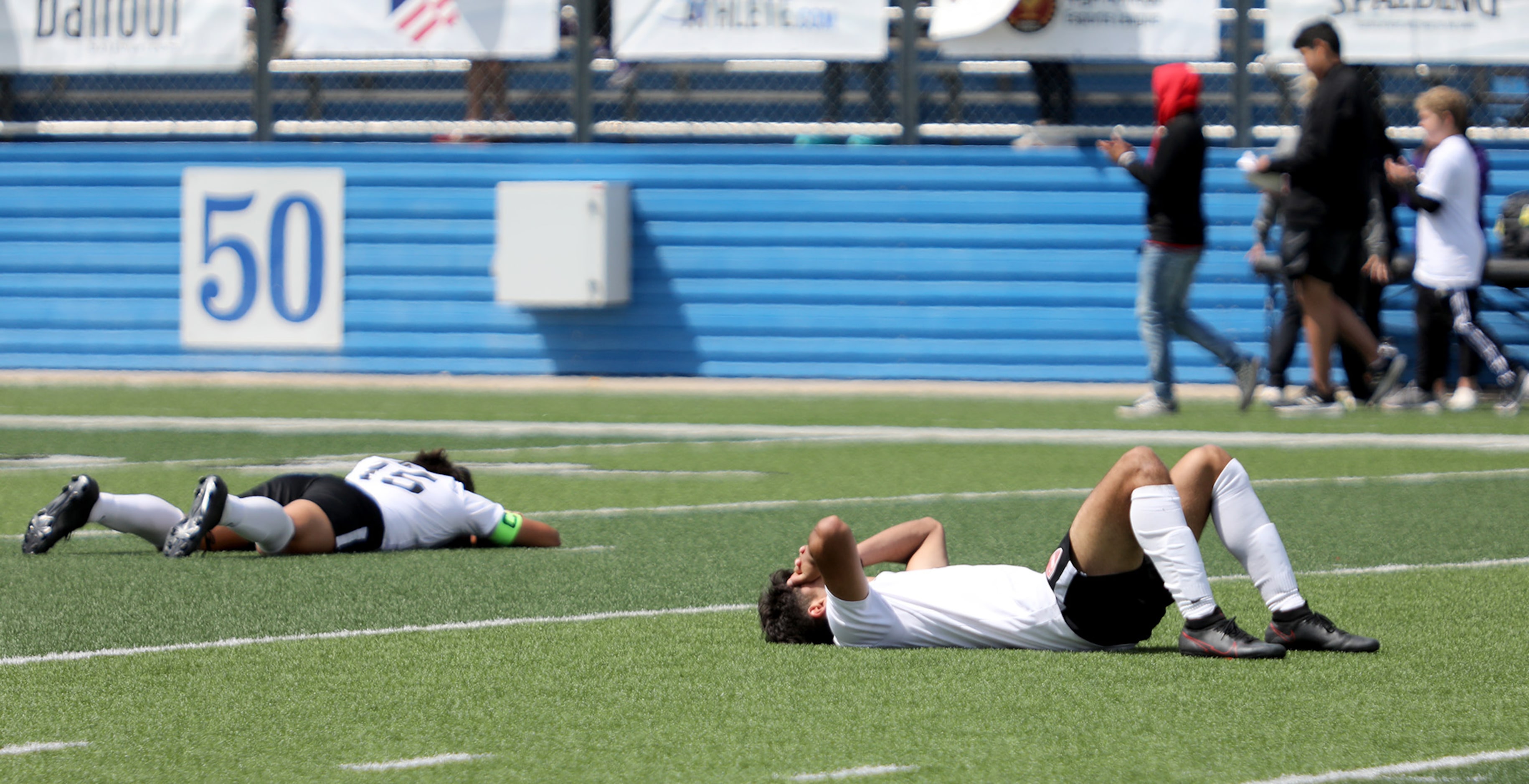 Fort Worth Diamond Hill-Jarvis players react after their UIL 4A boys State championship...