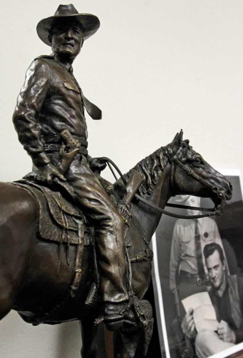 A commissioned sculpture of Clint Peoples is among items from his estate being auctioned...