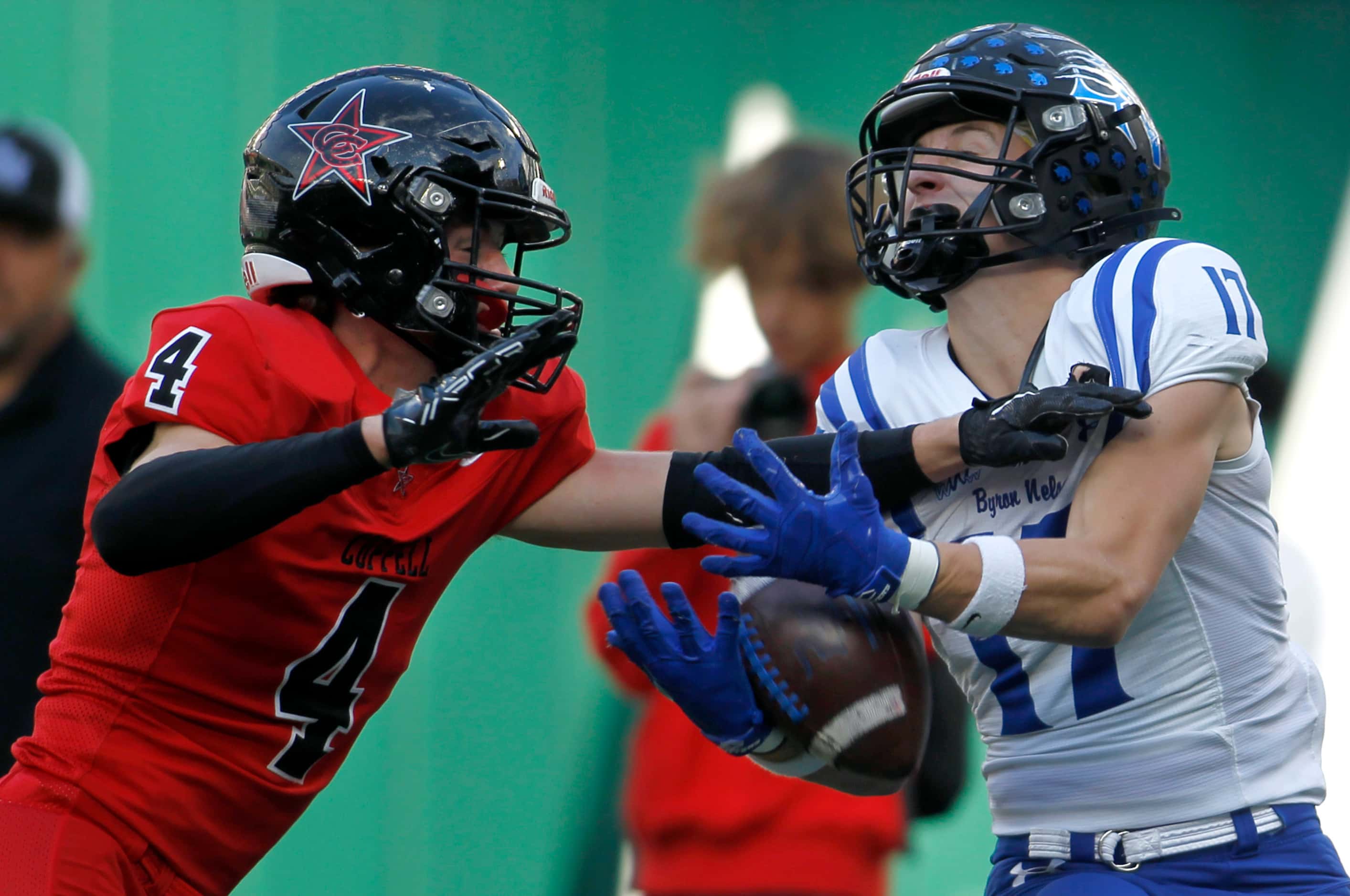 Coppell safety Scott Fishpaw (4), left, breaks up a pass intended for Byron Nelson receiver...