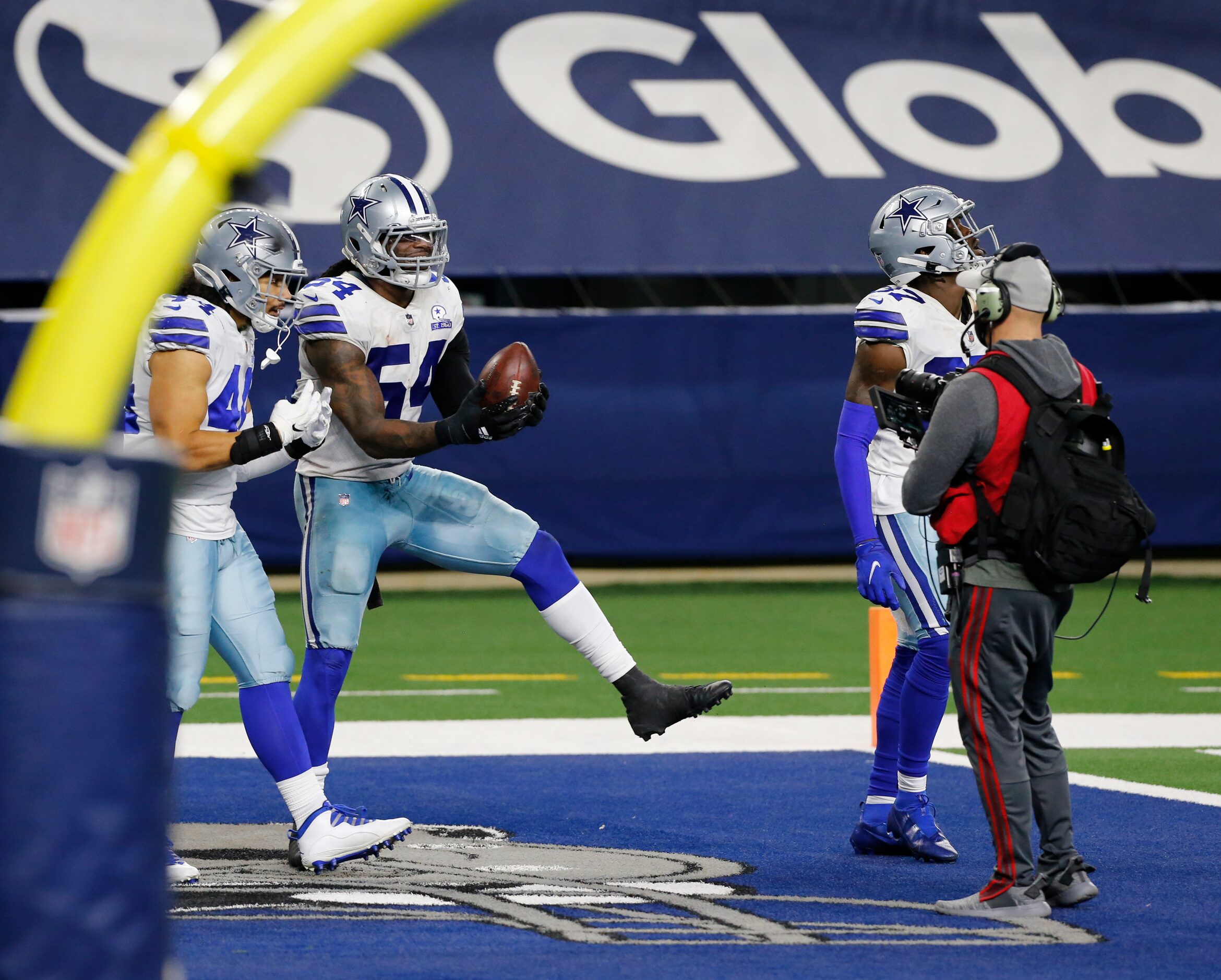 A FOX field videographer shoots Dallas Cowboys middle linebacker Jaylon Smith (54) after he...