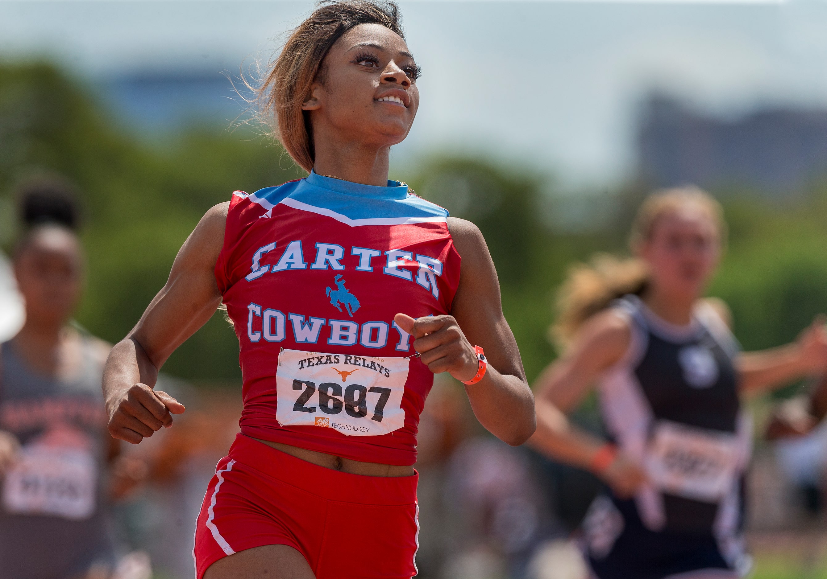 Dallas Carter's Sha'Carri Richardson (2697) finishes first in the girls Division I 100 meter...