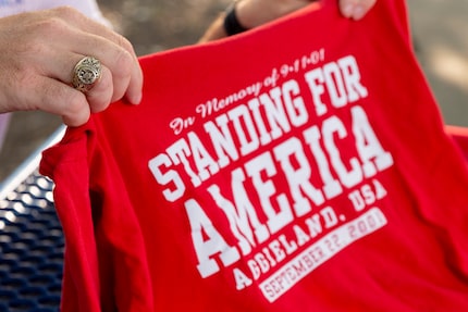 Josh Rosinski displays an original T-shirt sold for Texas A&M’s "Red, White and Blue Out"...