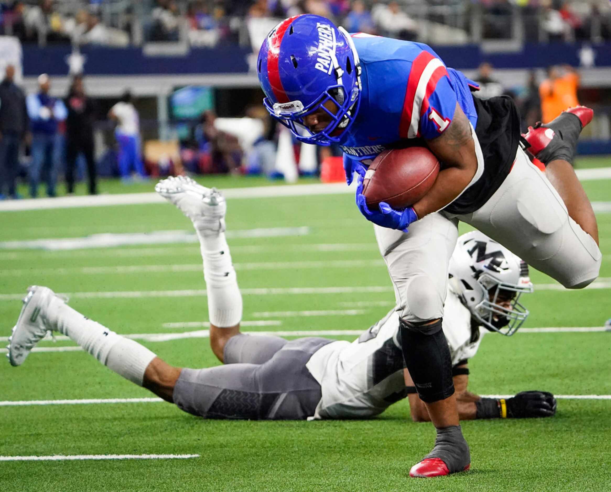 Duncanville running back  Trysten Smith scores on a 6-yard touchdown run during the second...