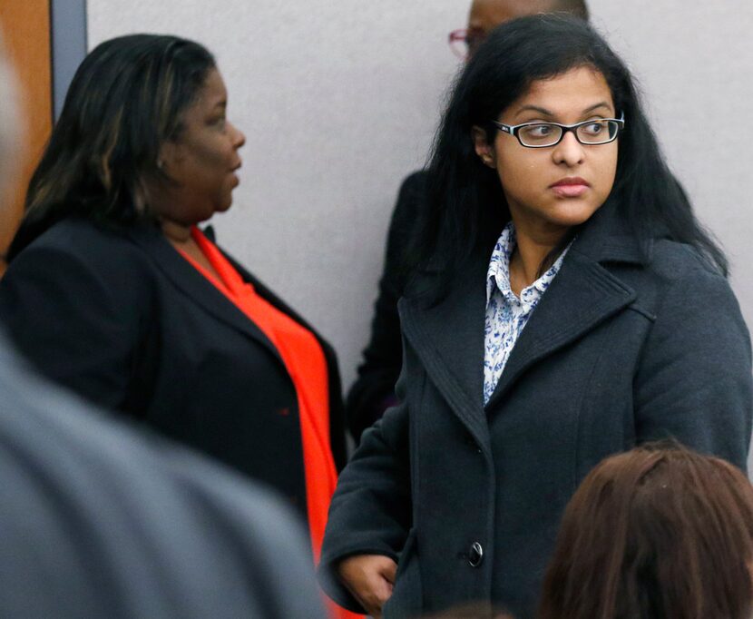 Sini Mathews (right) mother of Sherin Mathews, leaves Judge Cheryl Lee Shannon's courtroom...