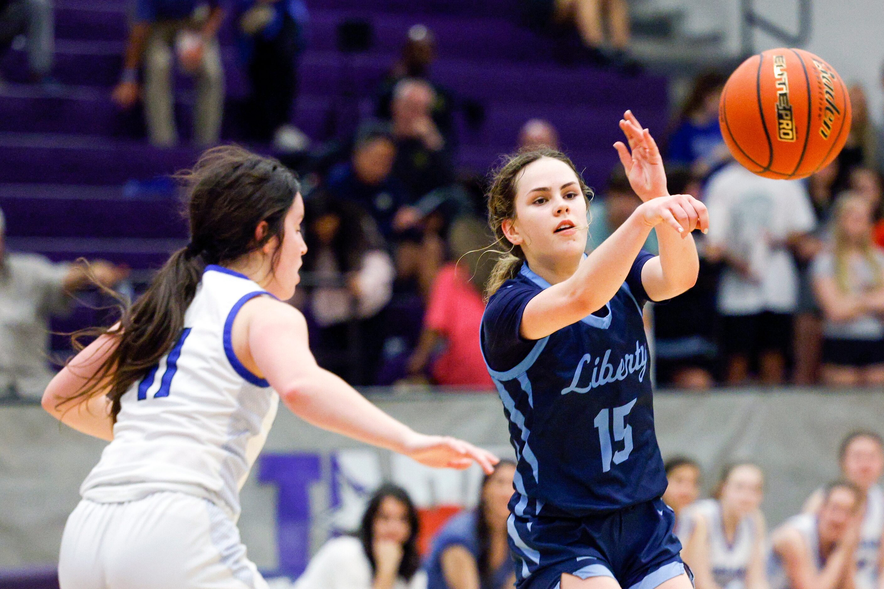 Argyle Liberty Christian guard Emma Martin (15) passes the ball up court ahead of Tyler...