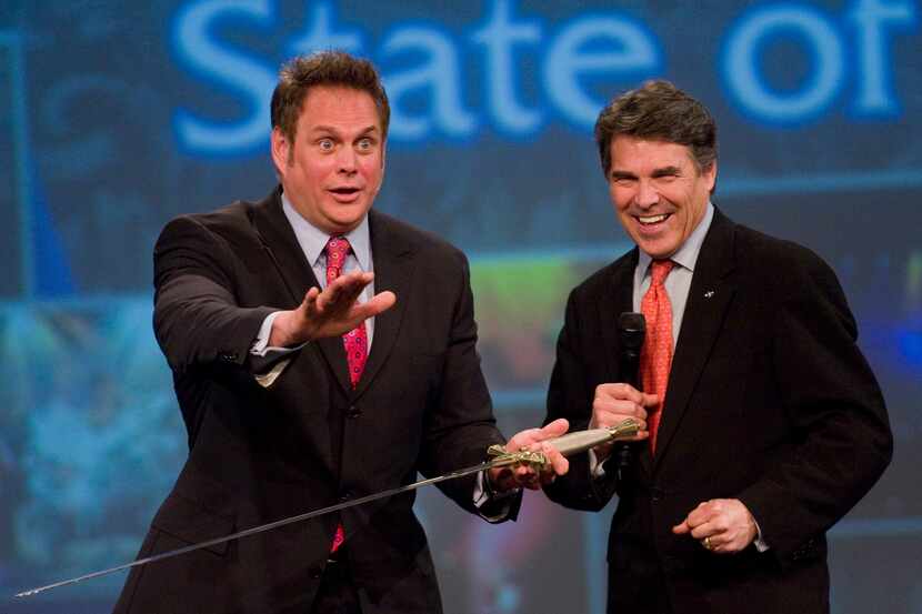 Keith Craft (left), pastor of Elevate Life Church in Frisco, makes a joke about Gov. Rick...