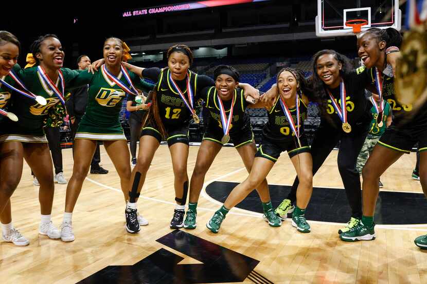 The DeSoto team celebrates after winning the Class 6A state championship at the Alamodome on...