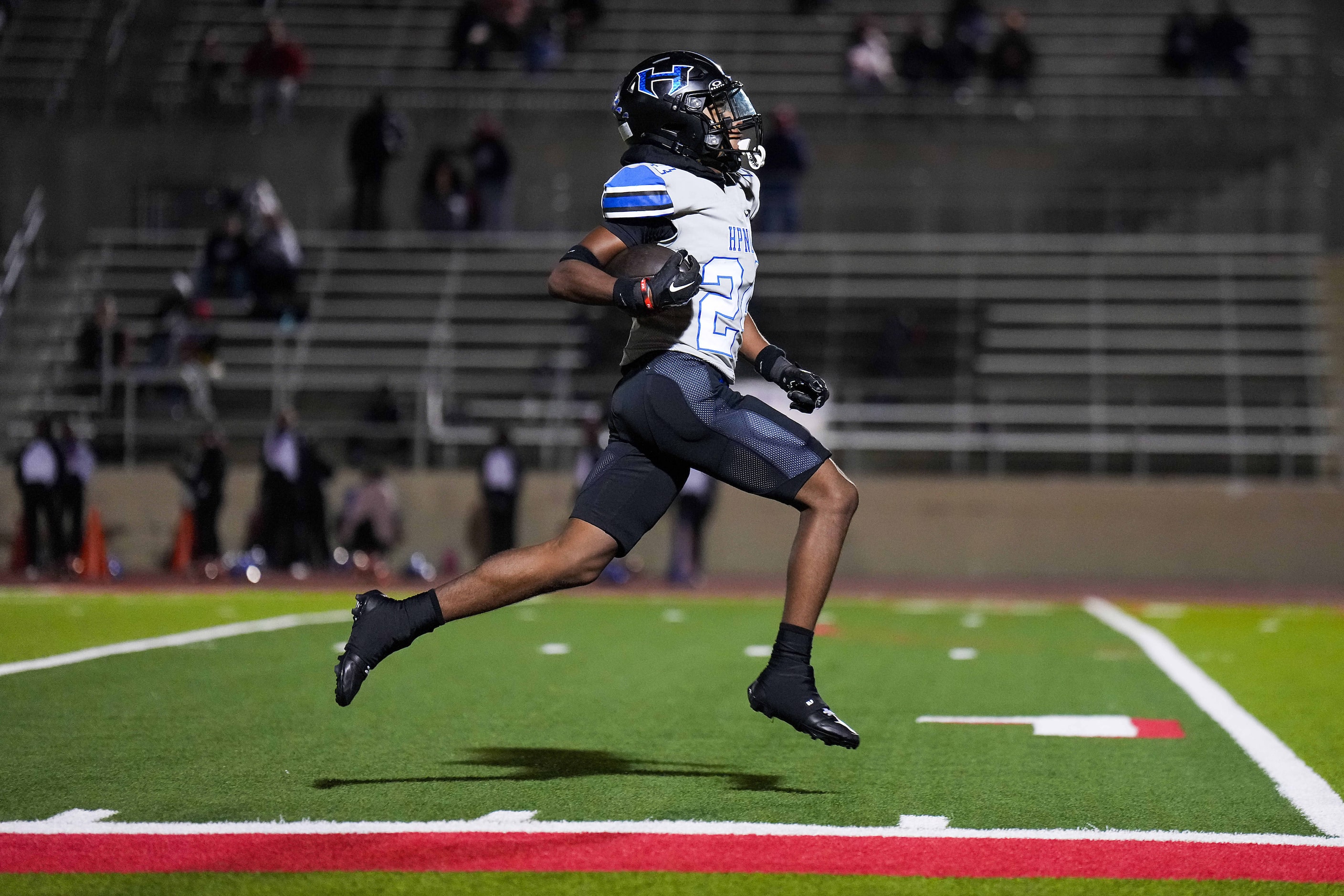 Hebron defensive back Jesse Tarver (24) races down the sideline on an 80-yard interception...