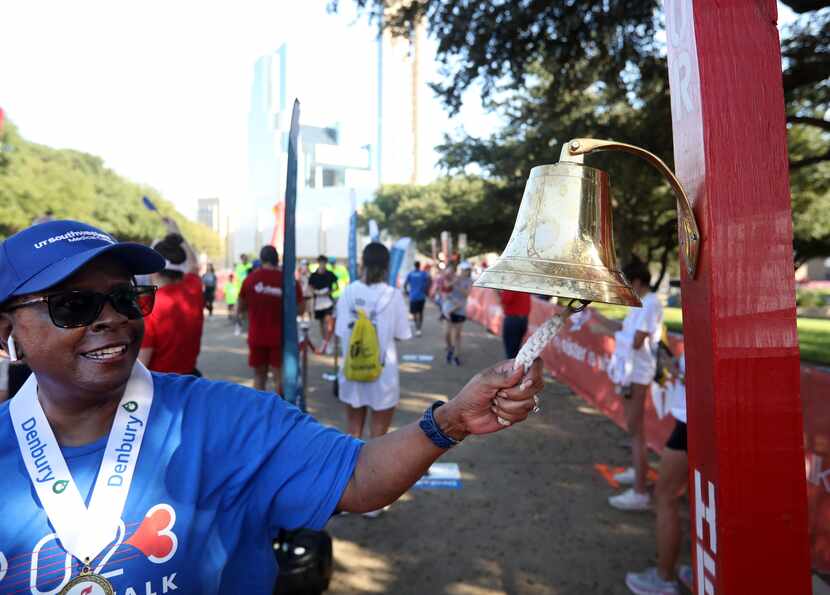 Monica Crayton rings a survivor's bell during The American Heart Association's Annual Heart...