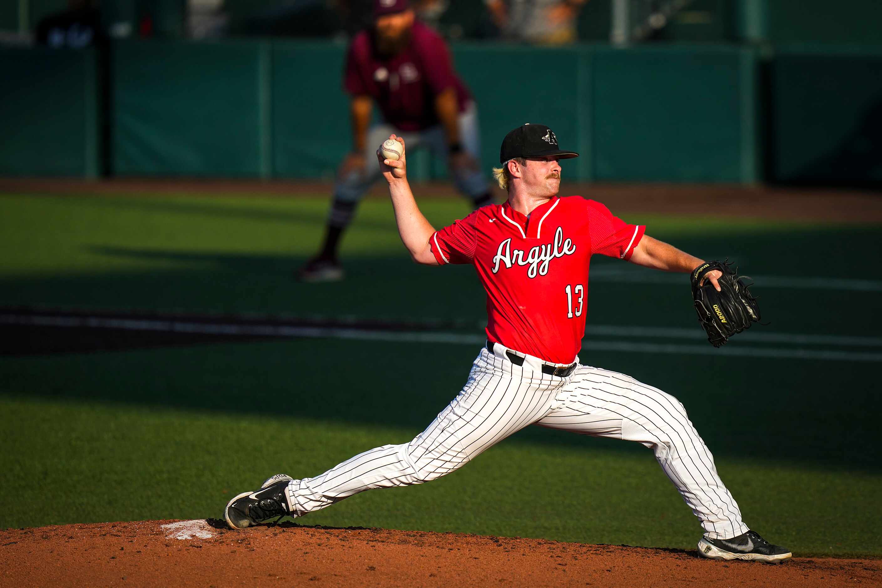 Argyle pitcher Trevor Duck delivers during the first inning of the UIL 4A baseball state...