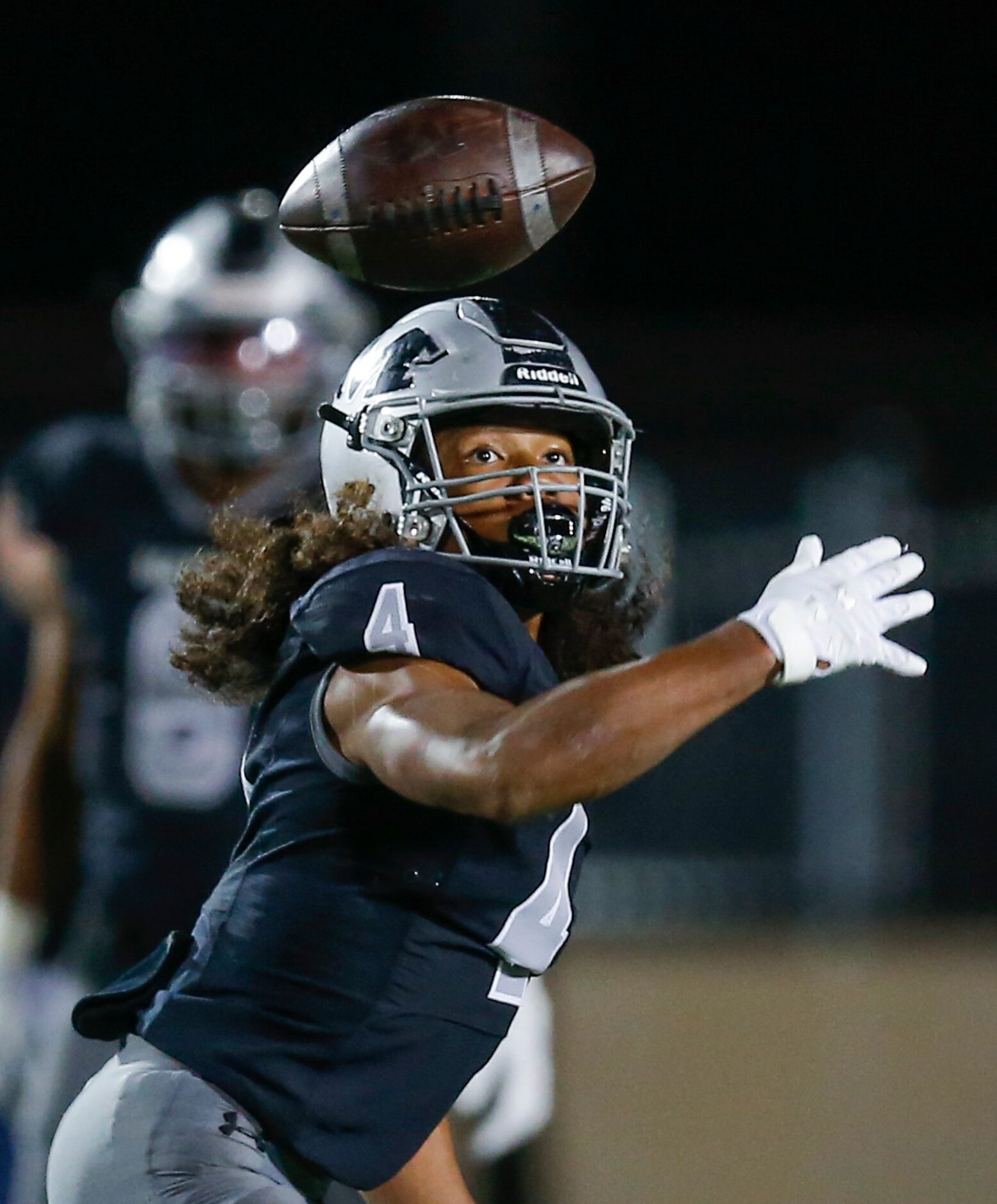 Arlington Martin junior Zaire Barrow (4) is unable to catch a pass during the first half of...