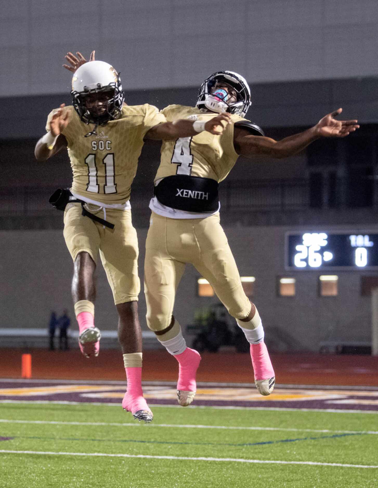 South Oak Cliff senior wide receiver DeMarco Moon (4) celebrates with sophomore running back...