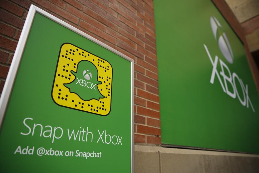 Snapchat with Xbox signage is displayed before the Microsoft Corp. Xbox event ahead of the...