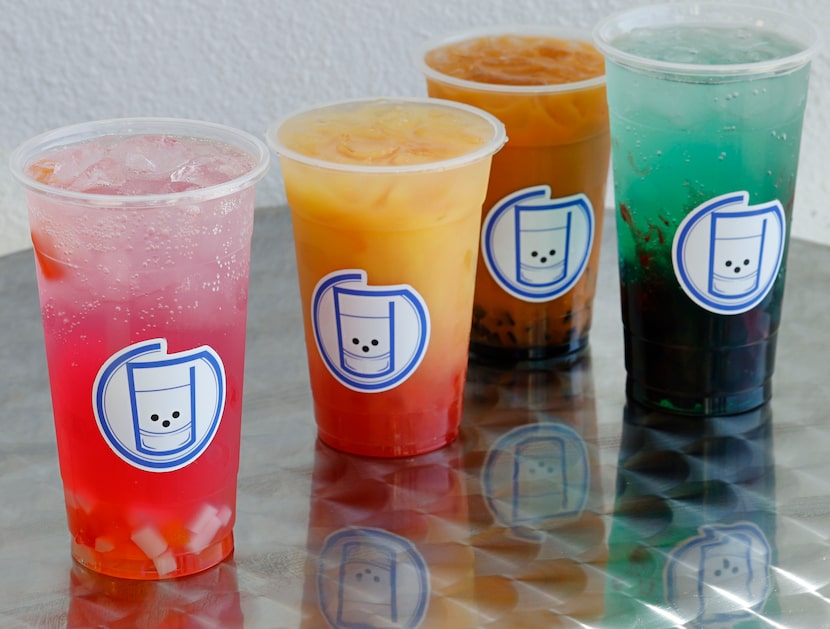 Dragonfruit Lemonade, from left, Tequila Sunrise, Spiked Thai Tea and Berry Mojito are seen...