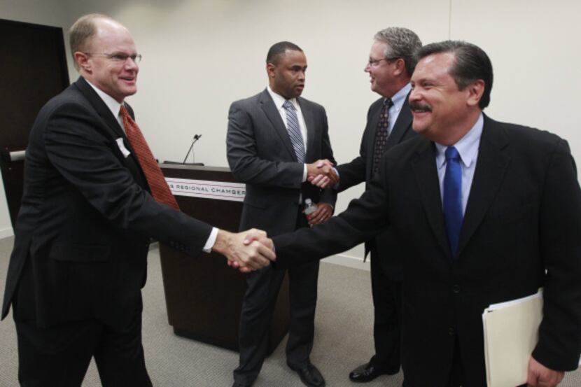 Domingo Garcia (right) and Marc Veasey (second from left) greeted business and Dallas...