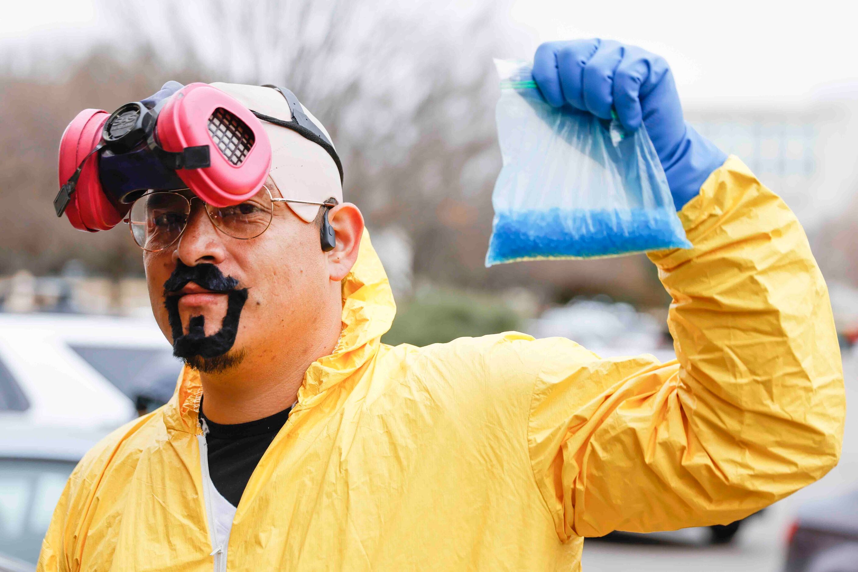 Anthony Cisneros of Dallas poses with his Breaking Bad attire as he waits in line alongside...