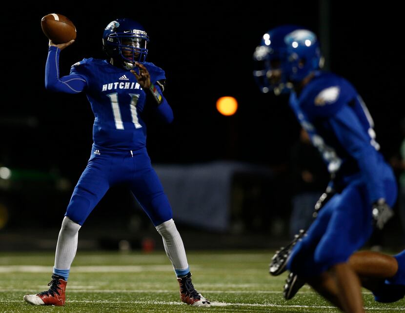 Wilmer-Hutchins quarterback Keondre McKnight passes against Kennedale in the first half of...