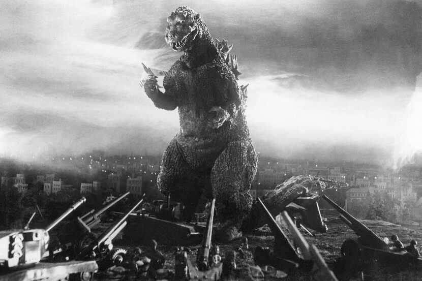 This photo taken from a scene of the 1954 film "Godzilla" and provided by Toho Co. Ltd.,...
