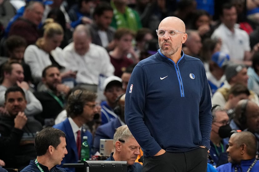 Dallas Mavericks head coach Jason Kidd watches from the sidelines during the first half of...