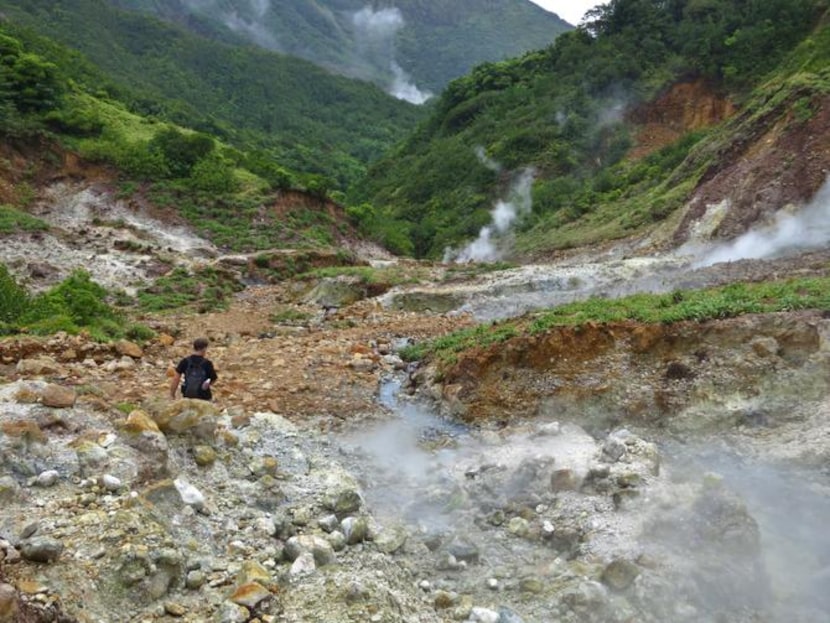 
In the Valley of Desolation, superheated steam hisses and sputters through multicolor pools.
