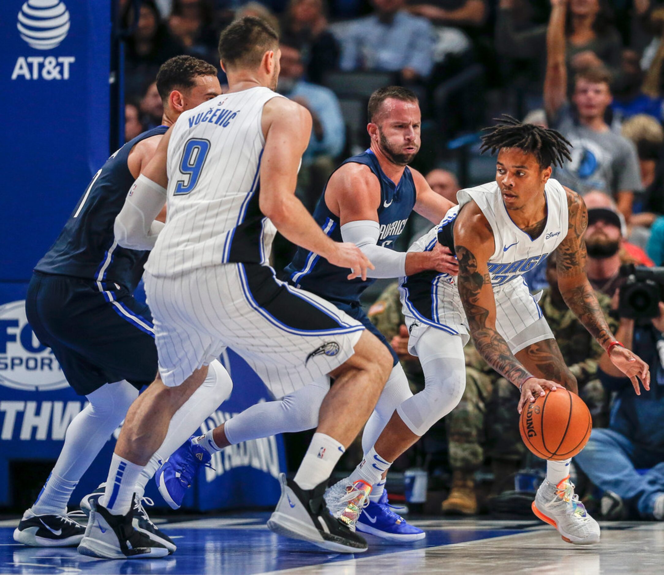 Dallas Mavericks guard J.J. Barea (5) guards Orlando Magic guard Markelle Fultz (20) during...