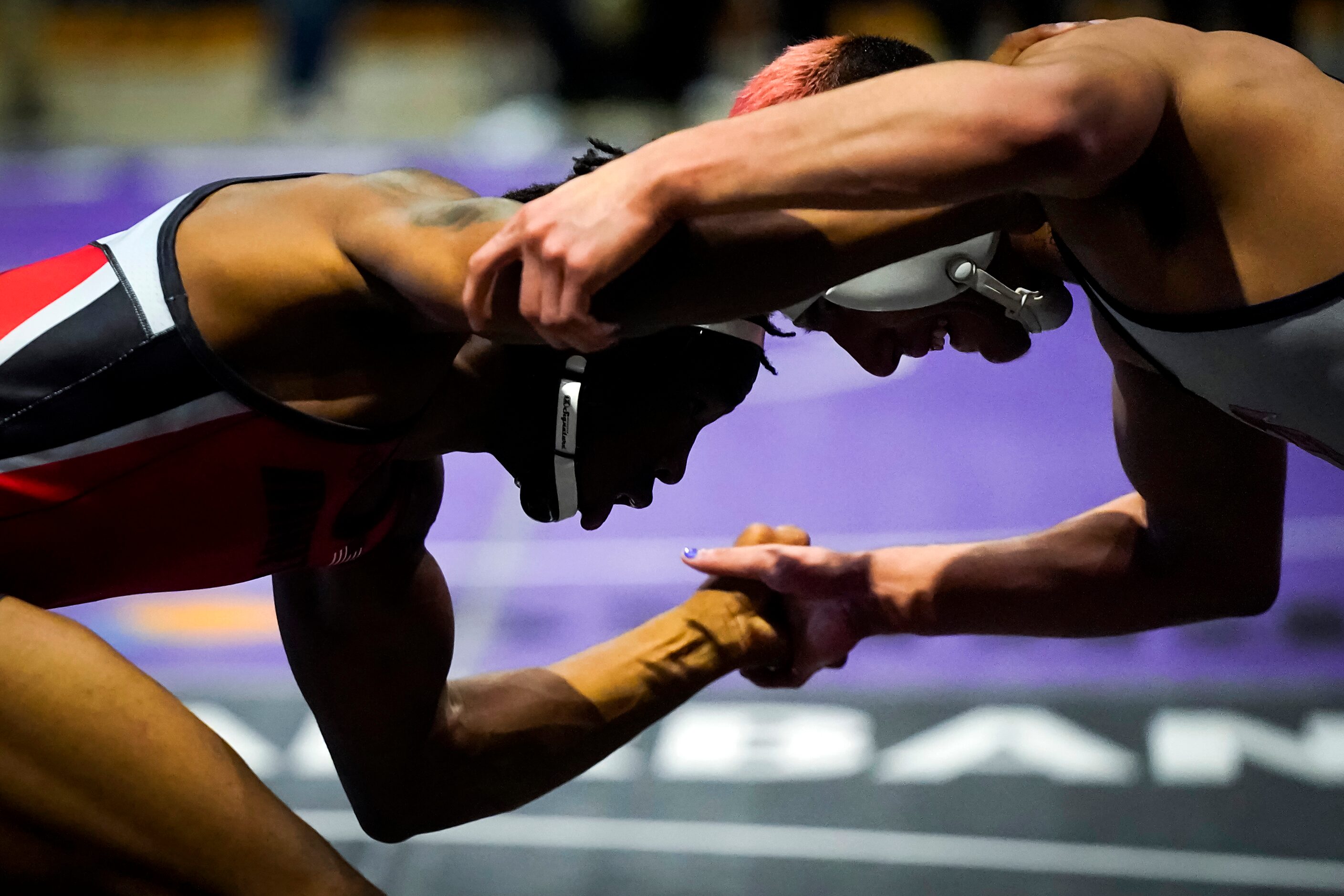 Sincere Bailey of Arlington Martin (left) wrestles Caleb Mata of Houston Clear Lake for the...