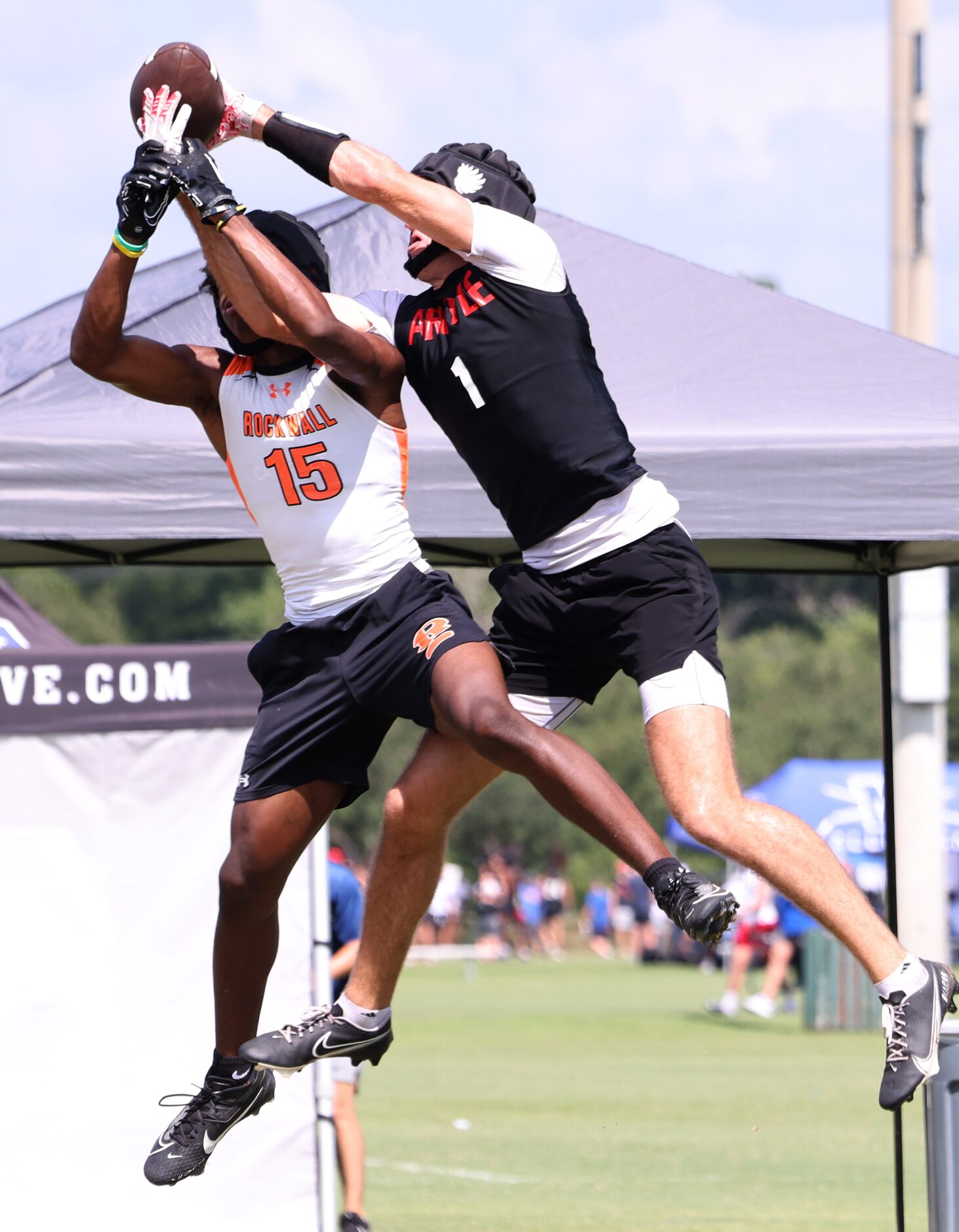 Argyle's Will Krzysiak (1), right, and Rockwall's AJ Brown (15) battle for possession of a...