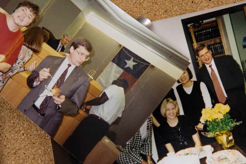 Old photos of Dallas County Chief Staff Attorney Kerry Young are posted in his conference...