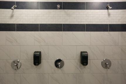 The shower facilities for high school football players seen during a tour of The Star, the...