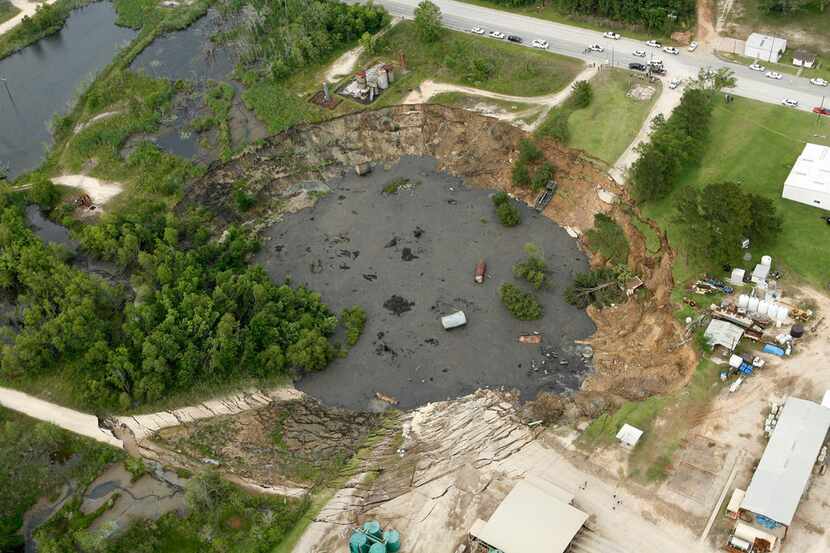 A massive sinkhole near Daisetta, Texas is seen Wednesday afternoon, May 7, 2008.  The...